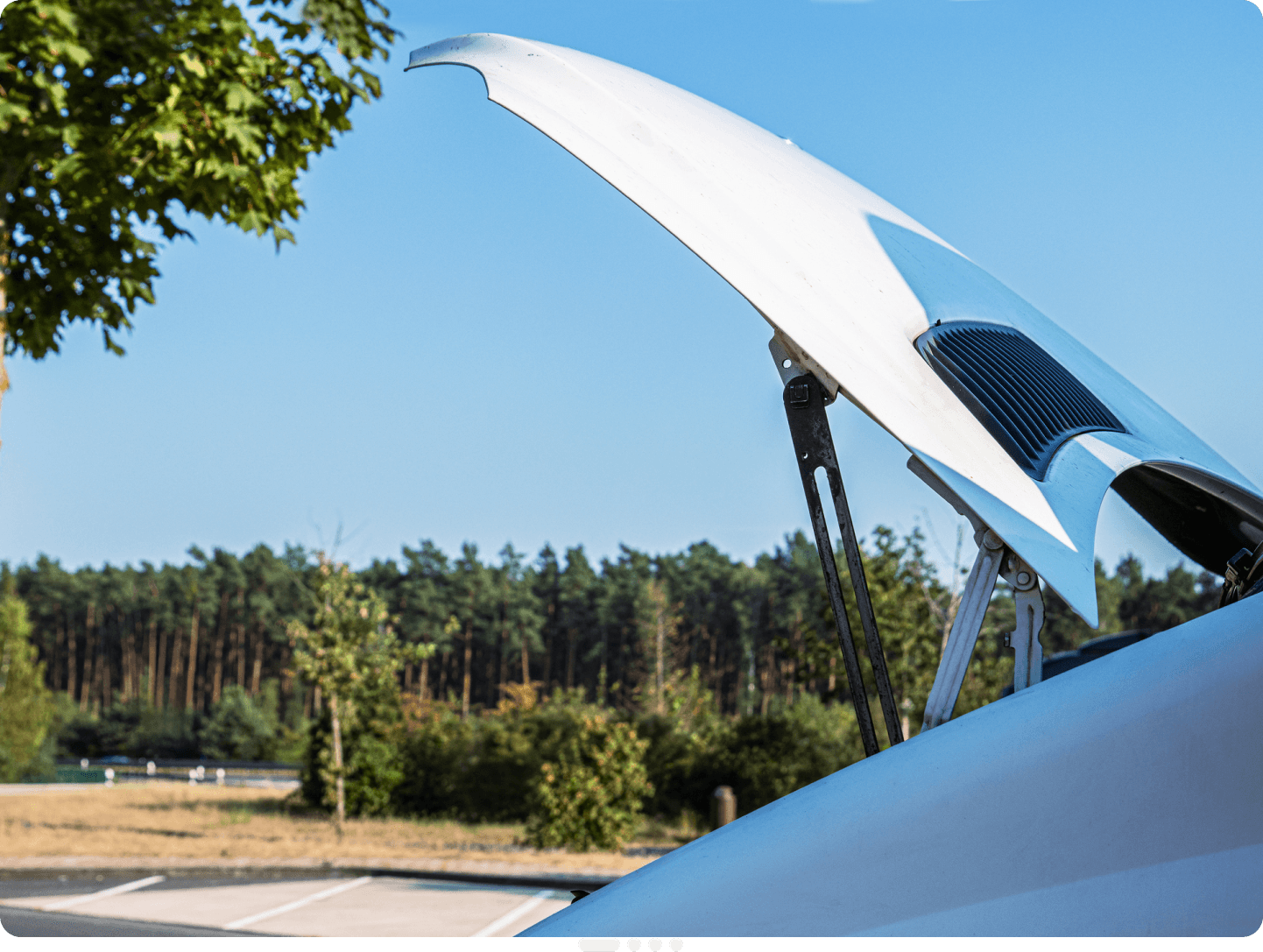 RV campsite setup with extended awning demonstrating emergency expense coverage