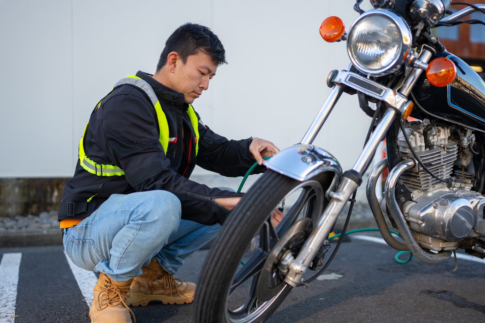 Mechanic working on motorcycle